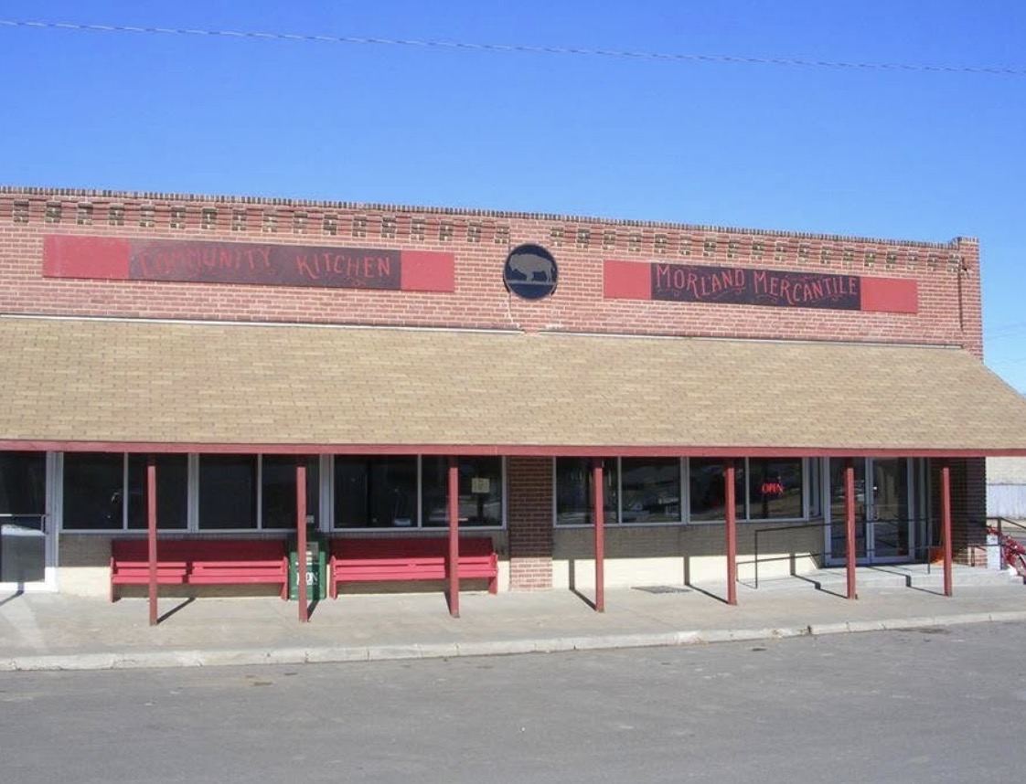 Community Kitchen and Morland Mercantile signs on the same storefront